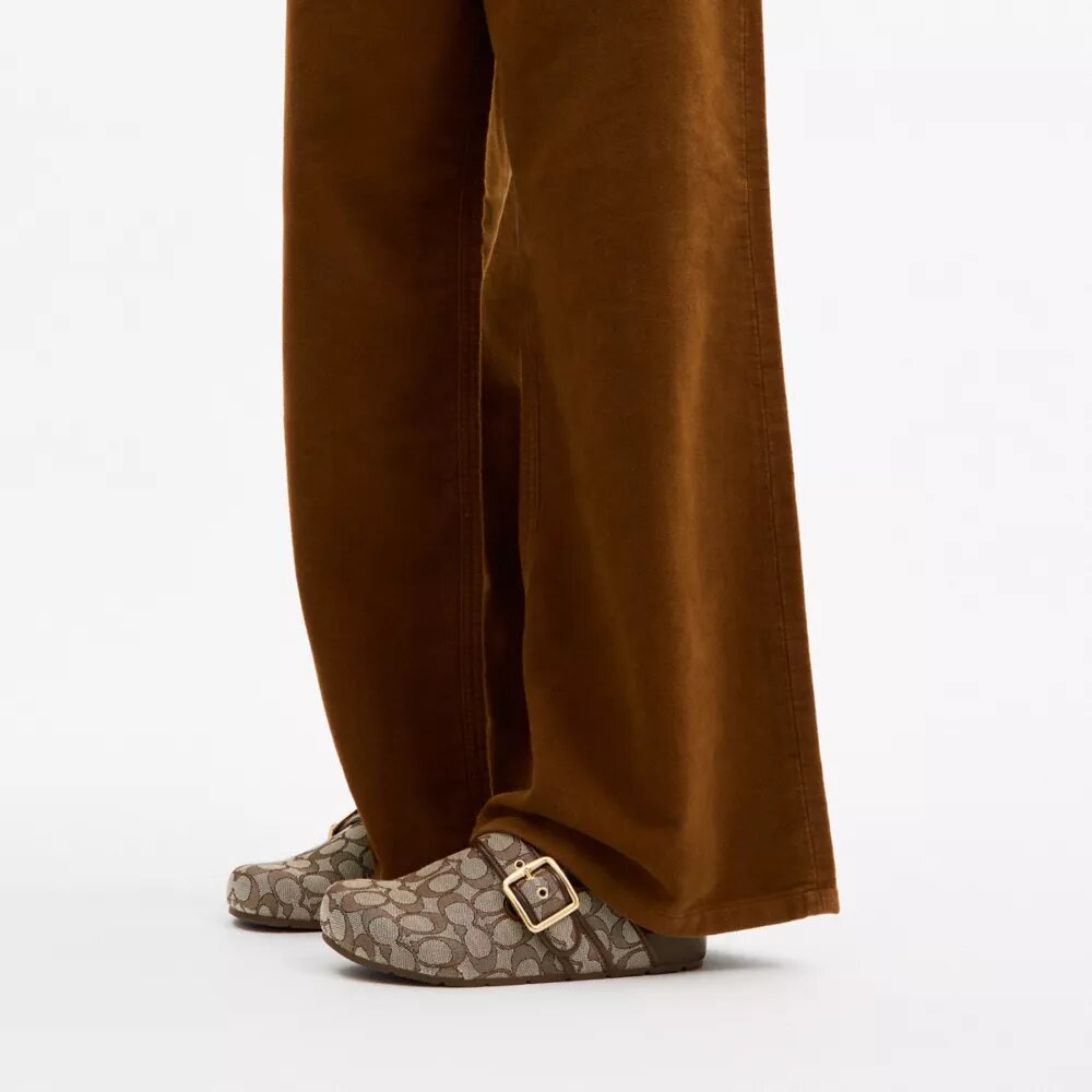 Archival-klompjes met gesp in kenmerkend jacquard
