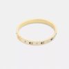 Armband met herhalend C-motief en scharnier