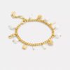 Armband met parel- en hartbedels
