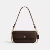 Brooke-tas met klep en ketting in Signature Canvas