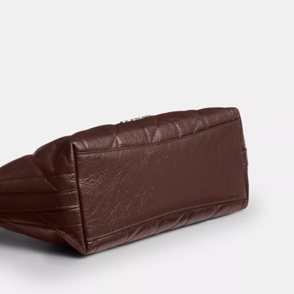Caitlin-schoudertas met doorkleedpatroon