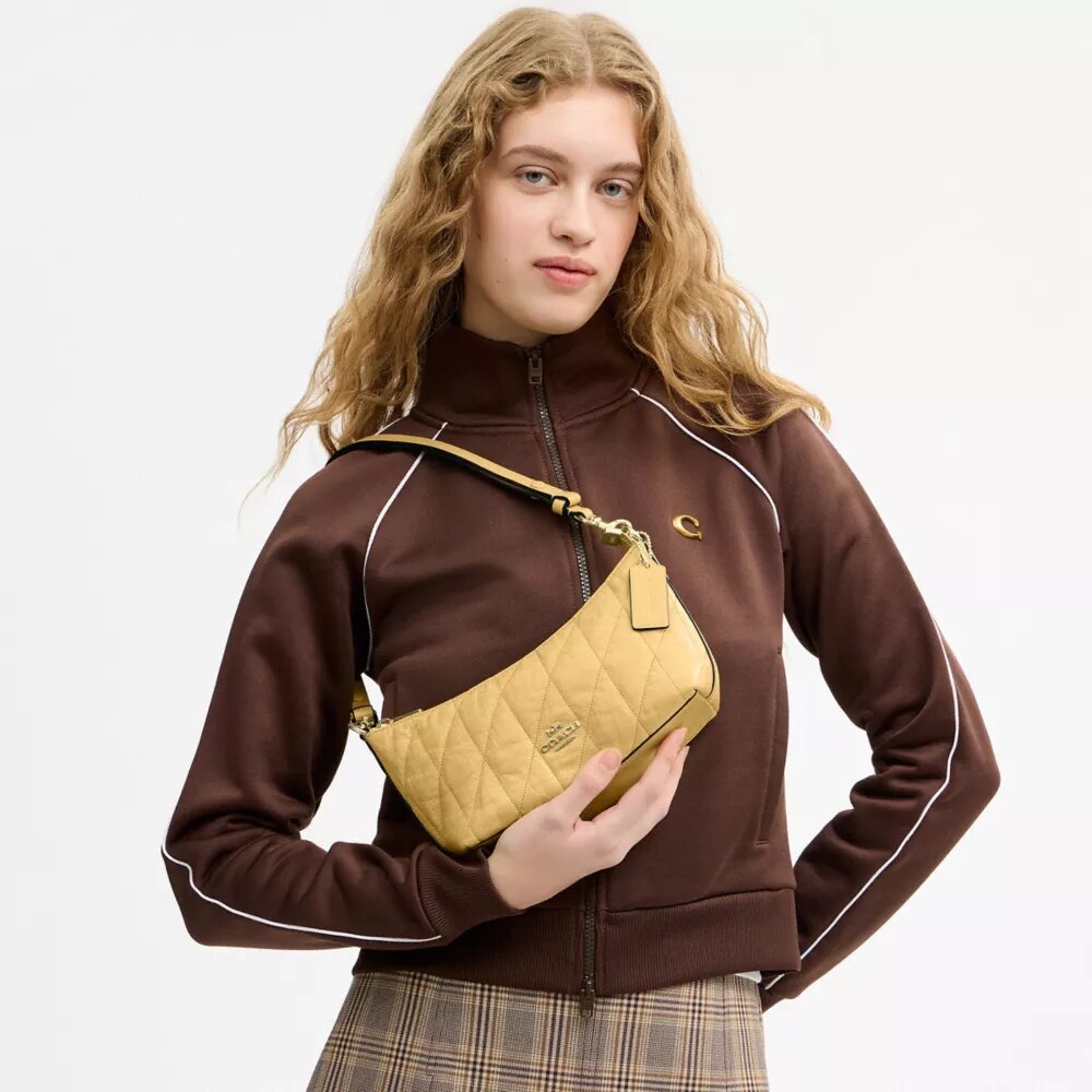 Caitlin-schoudertas met doorkleedpatroon
