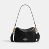 Carey-crossbodytas