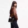 Carey-crossbodytas
