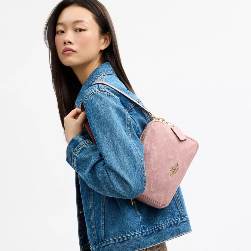 Carey-crossbodytas in kenmerkend denim