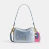 Carey-crossbodytas in 'Loved Denim' met bedels