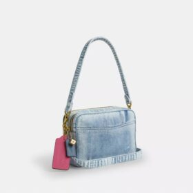 Carey-crossbodytas in ‘Loved Denim’ met bedels