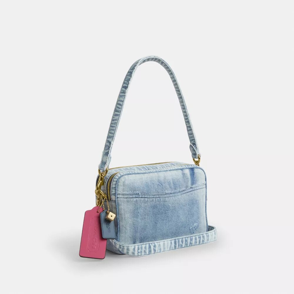 Carey-crossbodytas in 'Loved Denim' met bedels