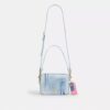 Carey-crossbodytas in 'Loved Denim' met bedels