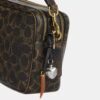 Carey-crossbodytas van het ‘Loved’ Signature Canvas met bedels