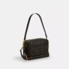 Carey-crossbodytas van het ‘Loved’ Signature Canvas met bedels