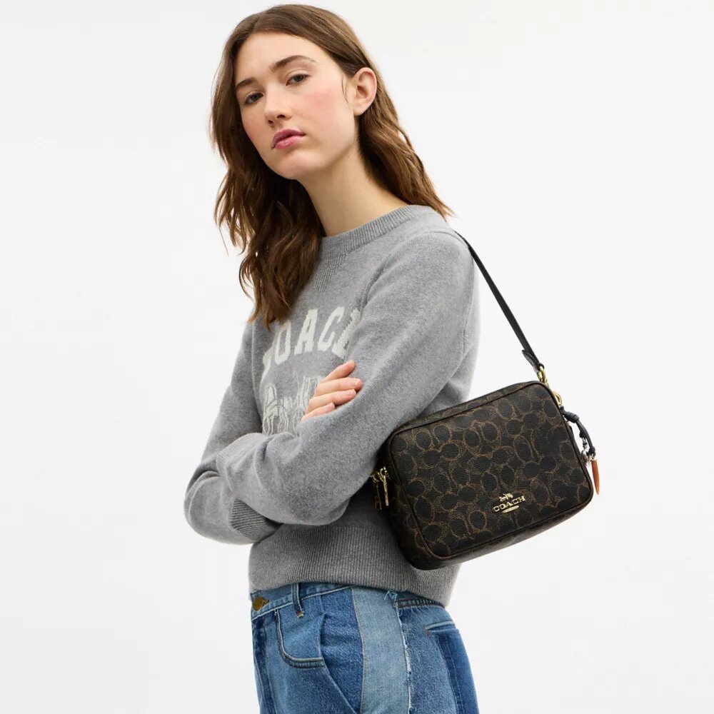 Carey-crossbodytas van het ‘Loved’ Signature Canvas met bedels