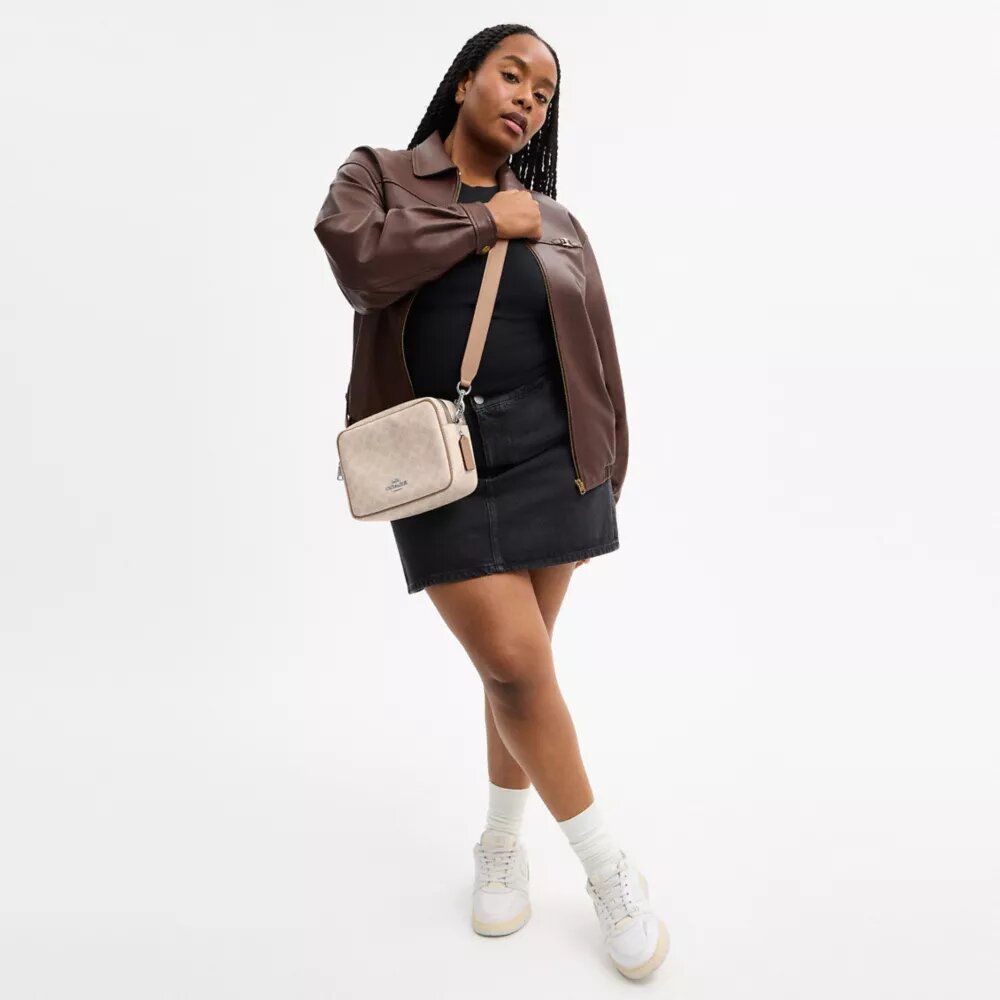 Carey-crossbodytas van Signature Canvas