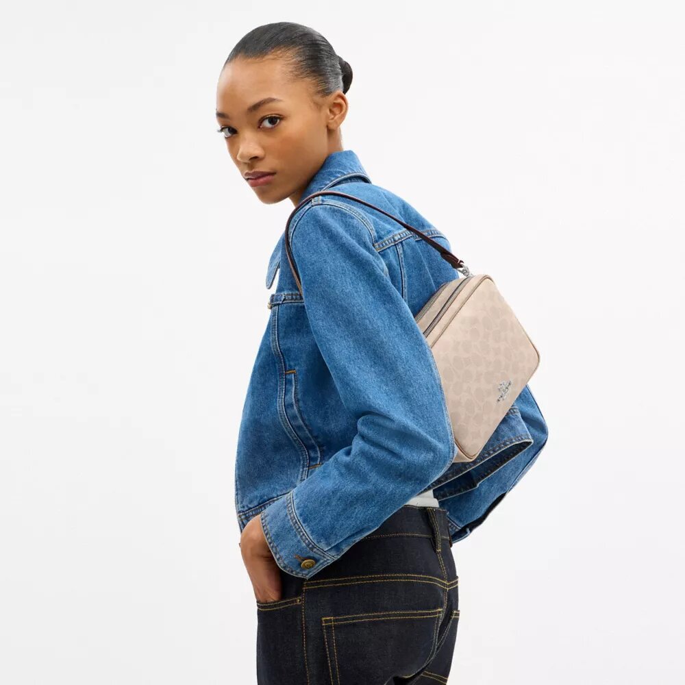 Carey-crossbodytas van Signature Canvas