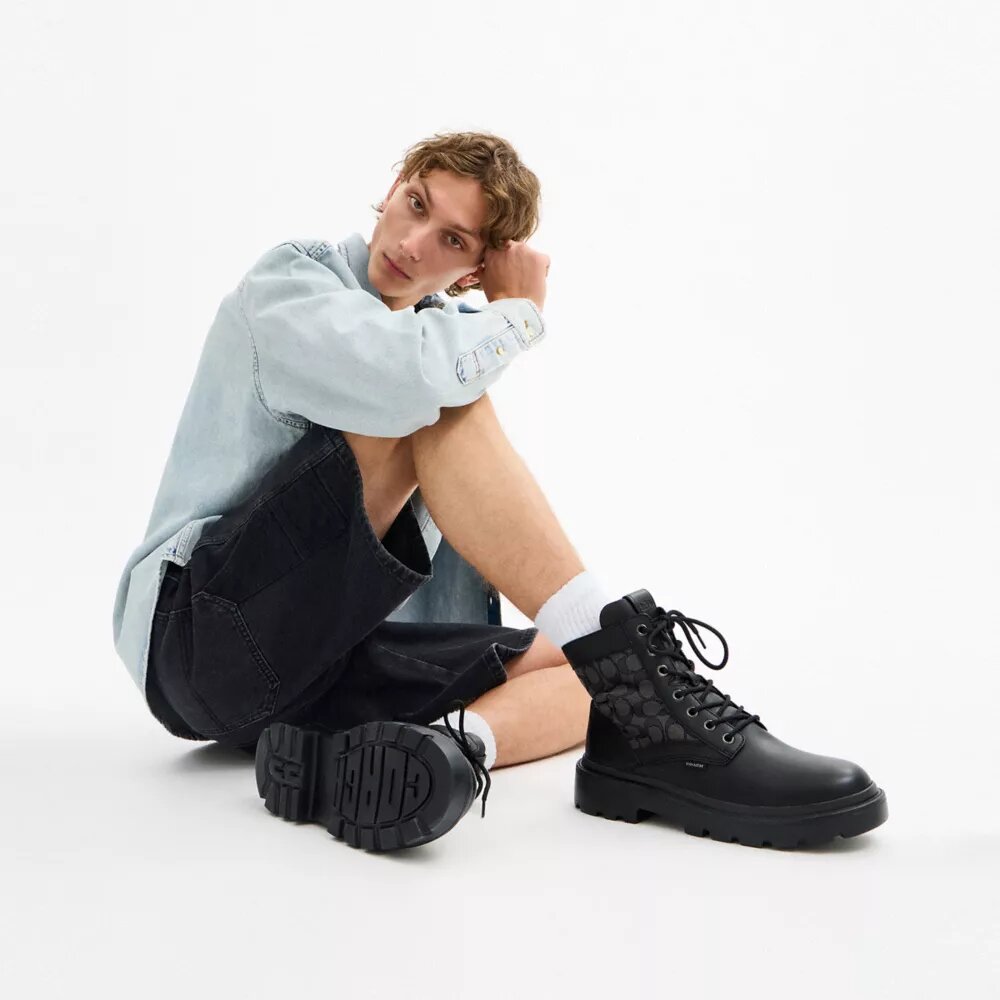 Combat boots with a distinctive jacquard pattern