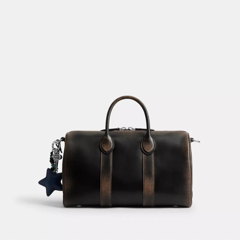 Compass-tas 35 van 'Loved Leather' met bedels