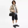 Compass-tas 35 van 'Loved Leather' met bedels
