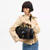 Compass-tas 35 van 'Loved Leather' met bedels