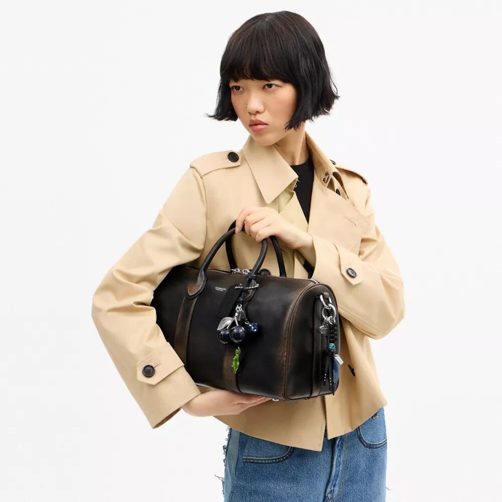 Compass-tas 35 van 'Loved Leather' met bedels