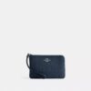 Corner Zip-polsbandtasje in Signature-jacquard