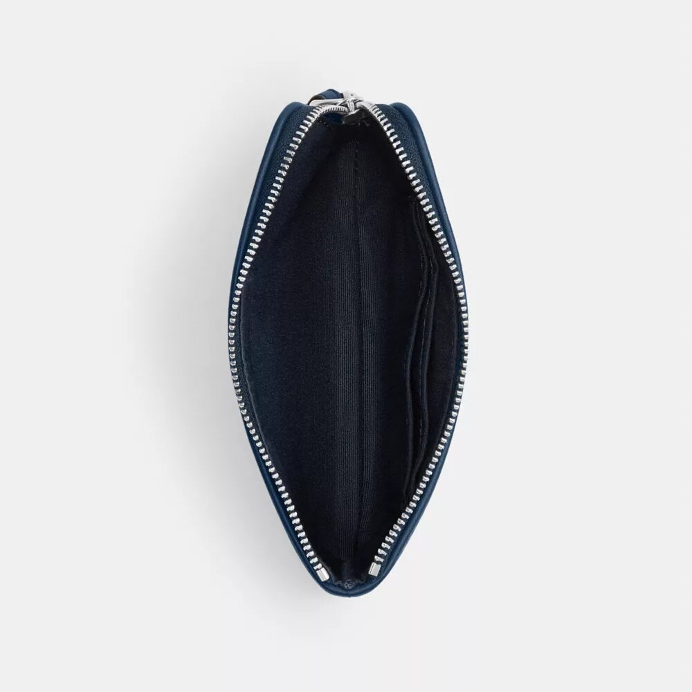 Corner Zip-polsbandtasje in Signature-jacquard