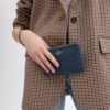 Corner Zip-polsbandtasje in Signature-jacquard