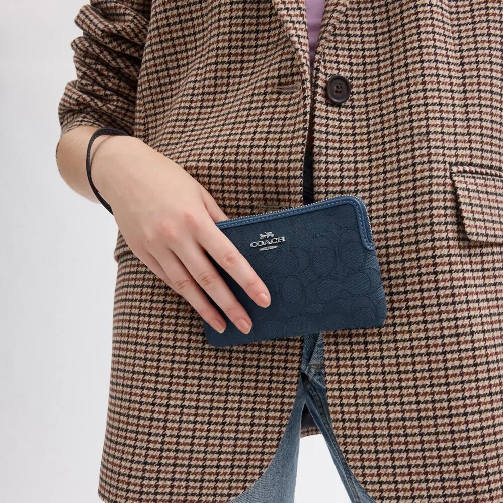Corner Zip-polsbandtasje in Signature-jacquard