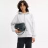 Dakota-crossbodytas van regeneratief katoendenim met bedels