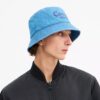 Denim buckethoed met geborduurd Coach-logo