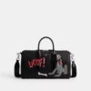 Disney X Coach Compass-tas 35 met Pluto