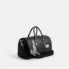 Disney X Coach Compass-tas 35 met Pluto