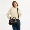 Disney X Coach Compass-tas 35 met Pluto