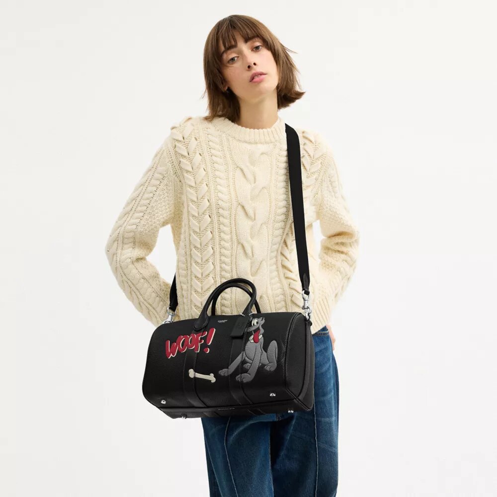 Disney X Coach Compass-tas 35 met Pluto