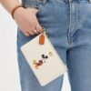 Disney X Coach Essential kleine polbandtasjes van regeneratief leer met Mickey Mouse