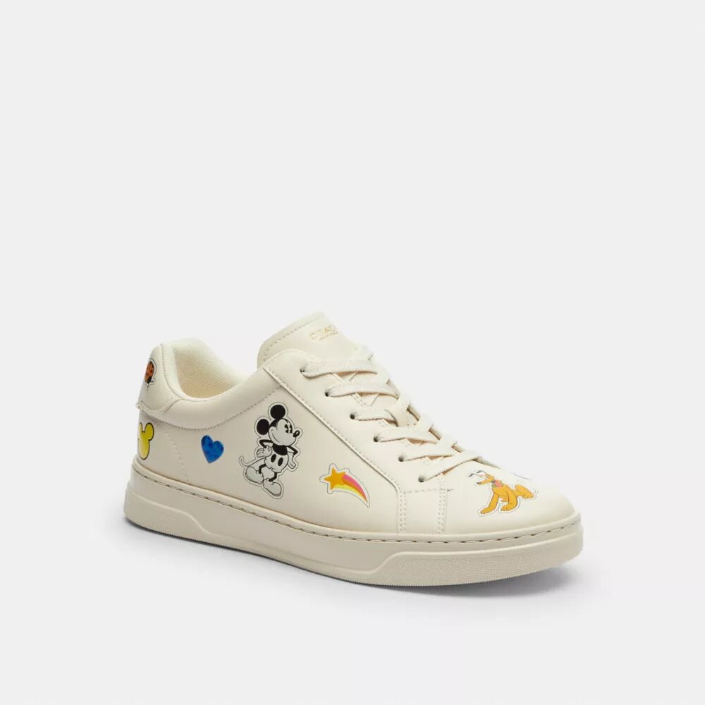 Disney X Coach Hoge sneakers met stickerprint