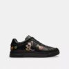 Disney X Coach Hoge sneakers met stickerprint