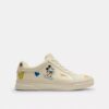 Disney X Coach Hoge sneakers met stickerprint