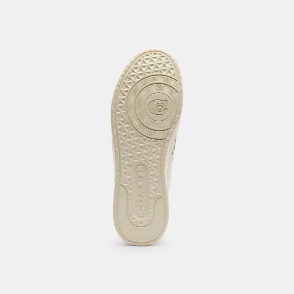 Disney X Coach Hoge sneakers met stickerprint