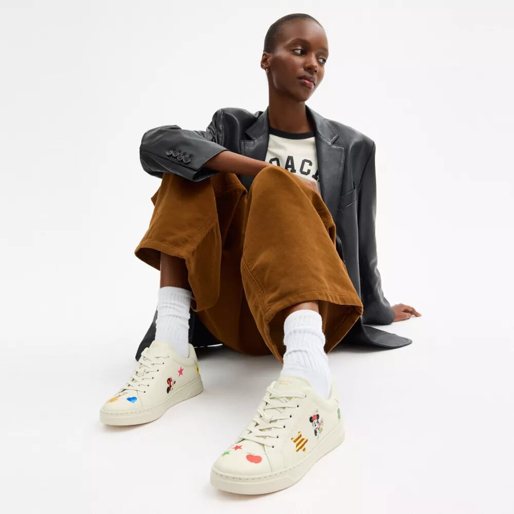 Disney X Coach Hoge sneakers met stickerprint