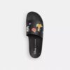 Disney X Coach-slippers met stickerprint