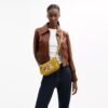 Disney X Coach Swinger-tassen van regeneratief leer met Mickey Mouse en vrienden