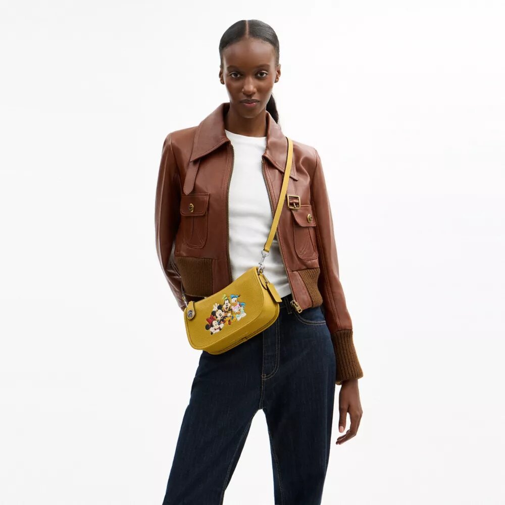 Disney X Coach Swinger-tassen van regeneratief leer met Mickey Mouse en vrienden