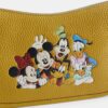 Disney X Coach Swinger-tassen van regeneratief leer met Mickey Mouse en vrienden