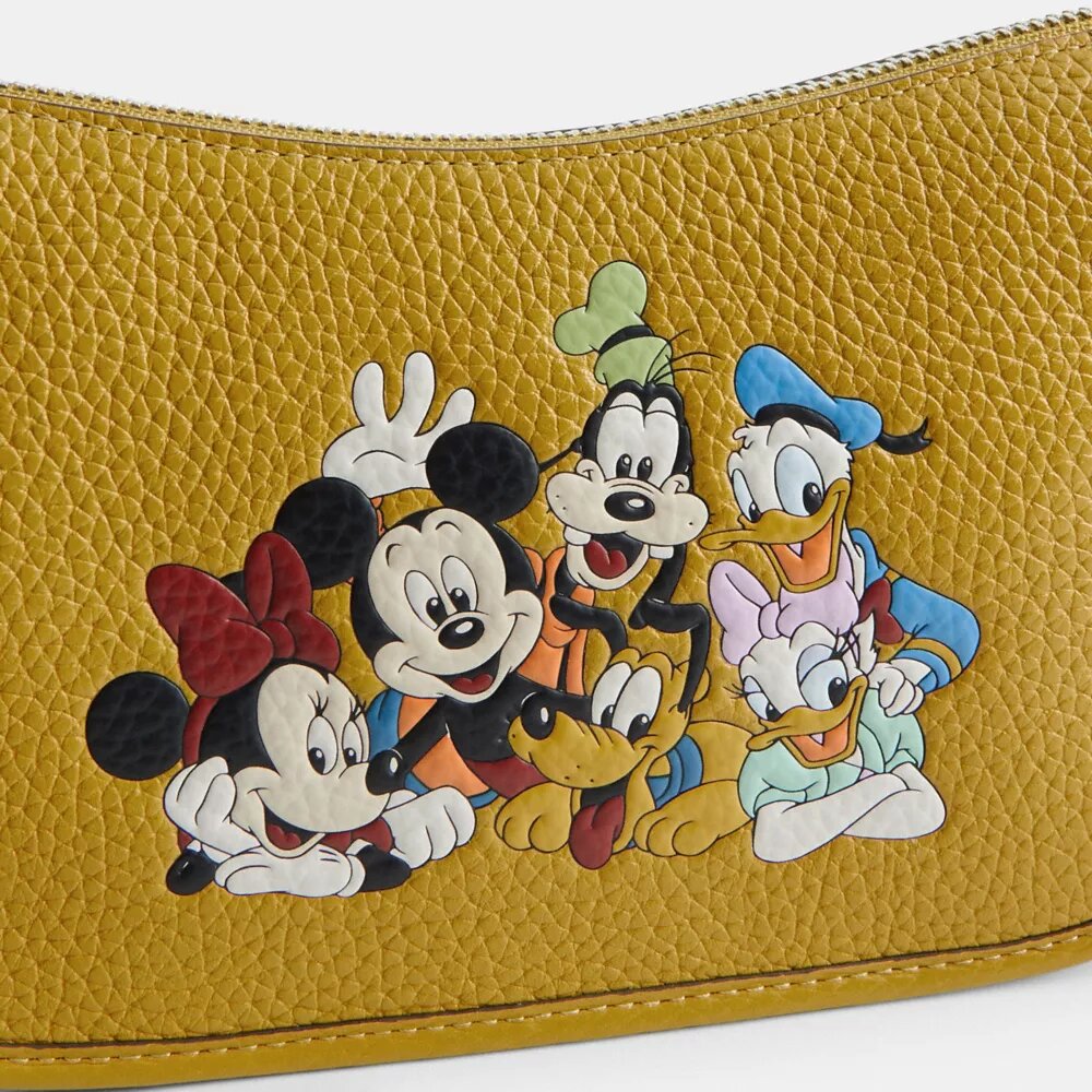 Disney X Coach Swinger-tassen van regeneratief leer met Mickey Mouse en vrienden