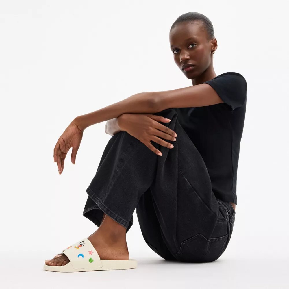 Disney X Coach Udele Sportslippers met stickerprint