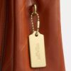 Elodie-crossbodytas met doorgestikt patroon