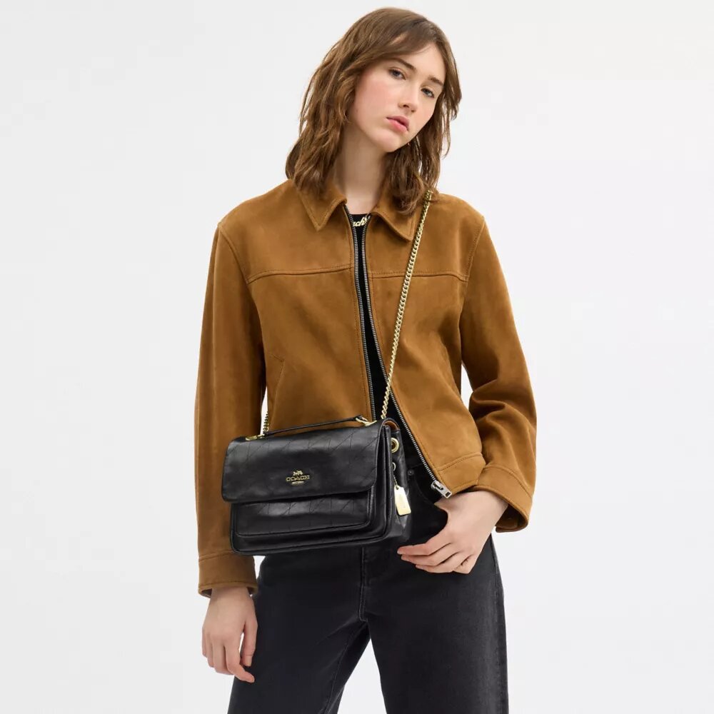 Elodie-crossbodytas met doorgestikt patroon