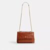 Elodie-crossbodytas met doorgestikt patroon