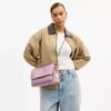 Elodie-crossbodytas met doorgestikt patroon