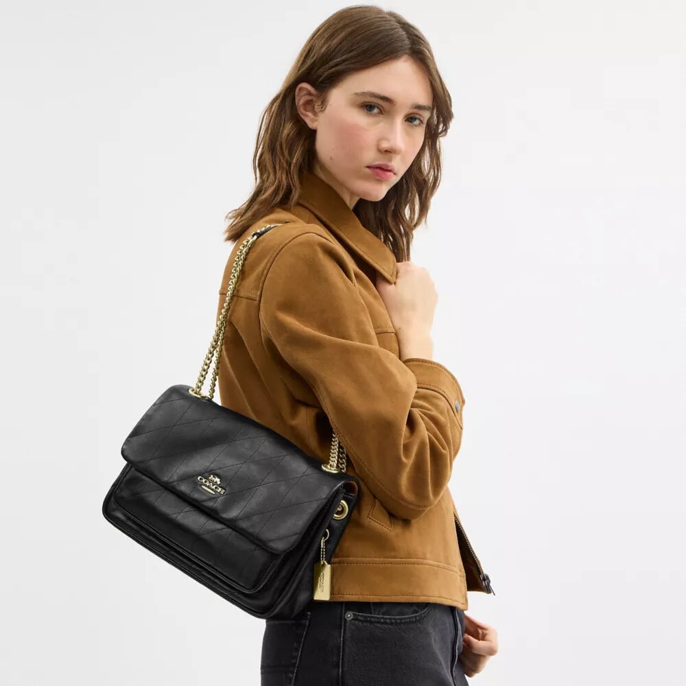Elodie-crossbodytas met doorgestikt patroon